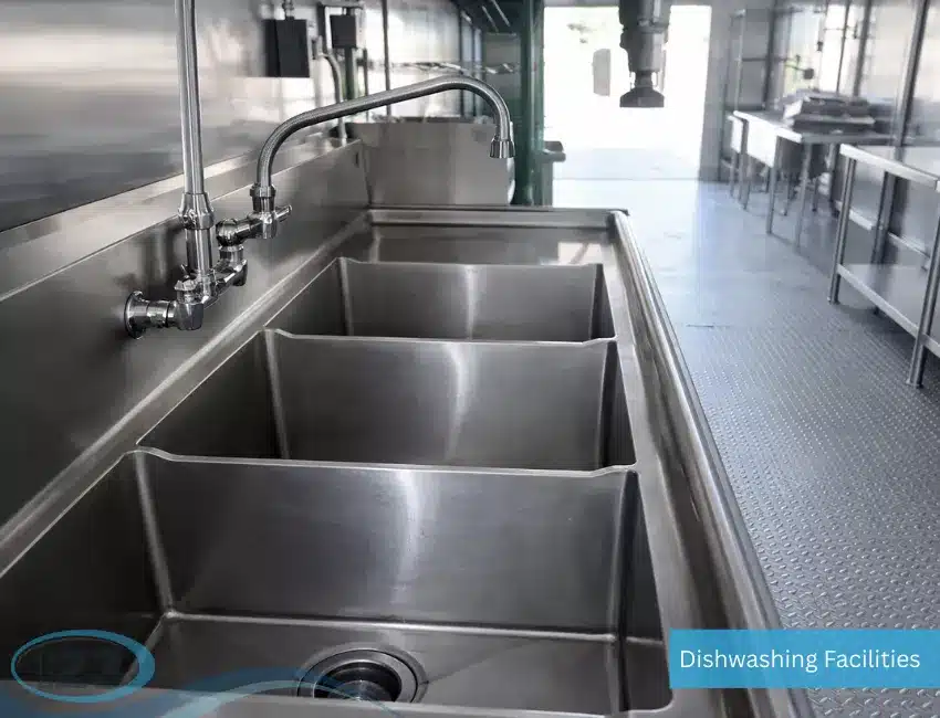 On-site dishwashing trailer providing dish cleaning and sanitation services for festivals and outdoor events.